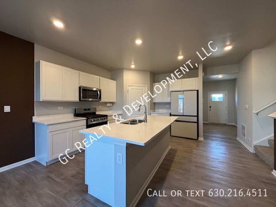 *** NEWER CONSTRUCTION / 4 BDRM - 2.5 BTH / FENCED YARD / IN UNIT LAUNDRY / SOLAR PANELS & TESLA CHARGER *** property image