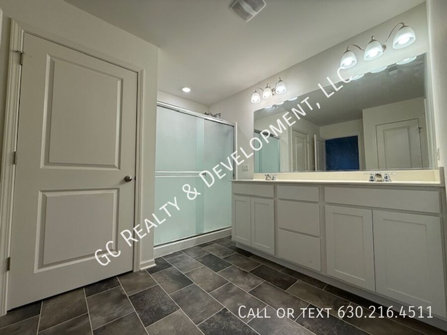 *** NEWER CONSTRUCTION / 4 BDRM - 2.5 BTH / FENCED YARD / IN UNIT LAUNDRY / SOLAR PANELS & TESLA CHARGER *** property image