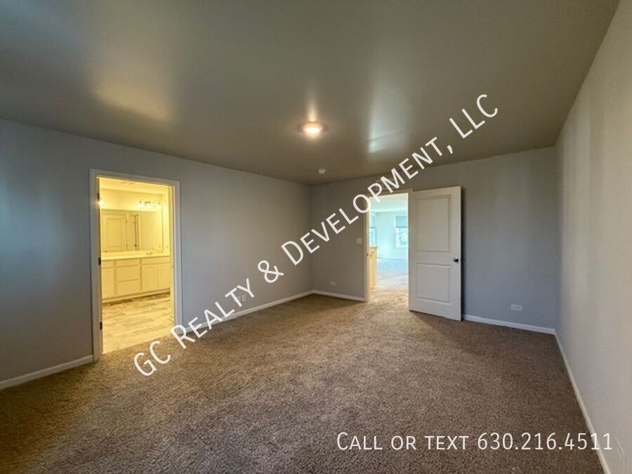 *** NEWER CONSTRUCTION / 4 BDRM - 2.5 BTH / FENCED YARD / IN UNIT LAUNDRY / SOLAR PANELS & TESLA CHARGER *** property image