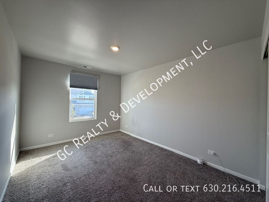 *** NEWER CONSTRUCTION / 4 BDRM - 2.5 BTH / FENCED YARD / IN UNIT LAUNDRY / SOLAR PANELS & TESLA CHARGER *** property image
