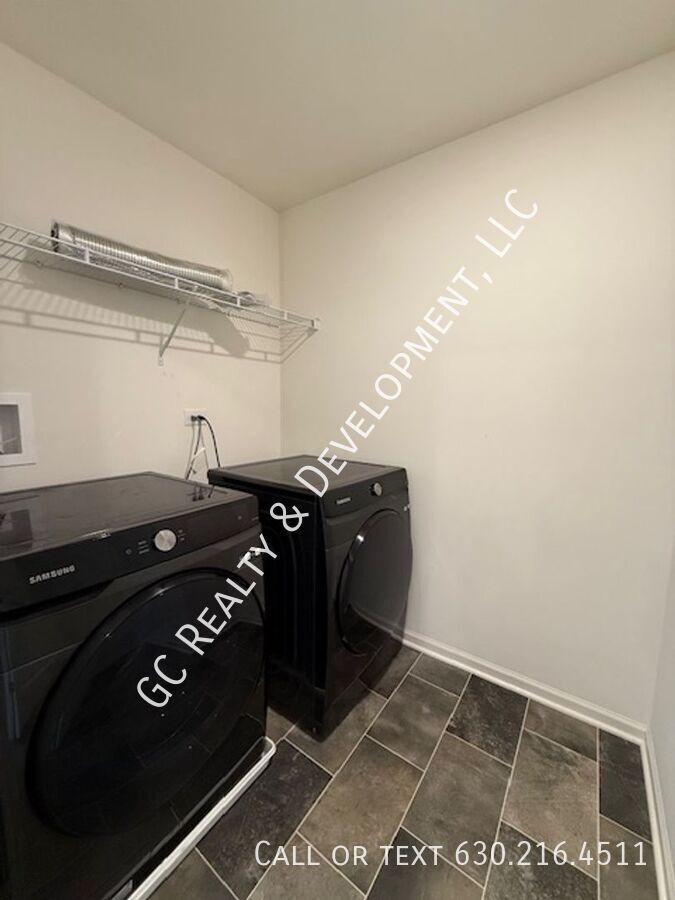 *** NEWER CONSTRUCTION / 4 BDRM - 2.5 BTH / FENCED YARD / IN UNIT LAUNDRY / SOLAR PANELS & TESLA CHARGER *** property image
