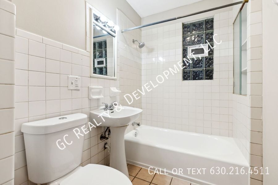 *** ​WRIGLEYVILLE LOCATION / FULLY UPDATED / 3 BDRM / APPL INCL / CENTRAL AIR *** property image