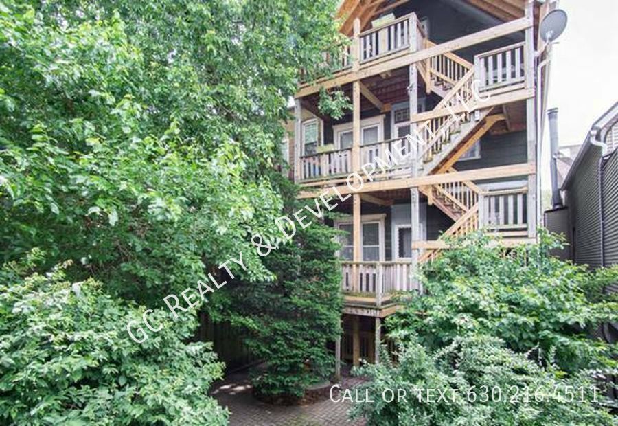 *** ​WRIGLEYVILLE LOCATION / FULLY UPDATED / 3 BDRM / APPL INCL / CENTRAL AIR *** property image