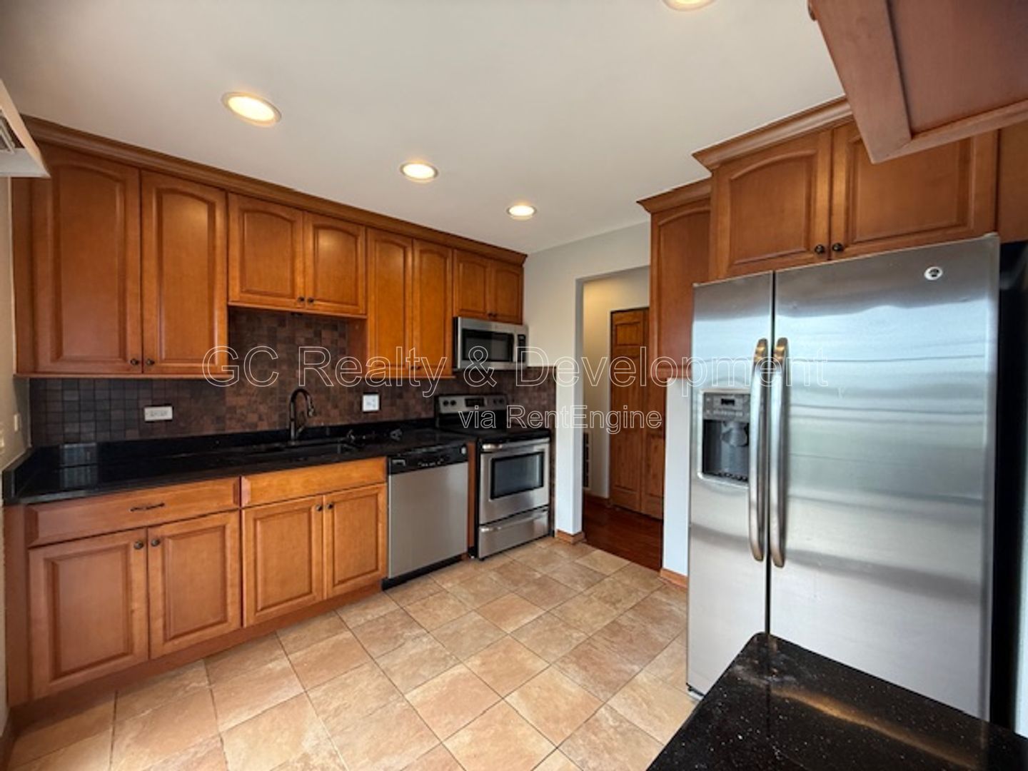 *** 3 BDRM - 2 BTH / FENCED YARD W LRG DECK / SS APPL / FINISHED BASEMENT / ATTACHED GARAGE *** property image