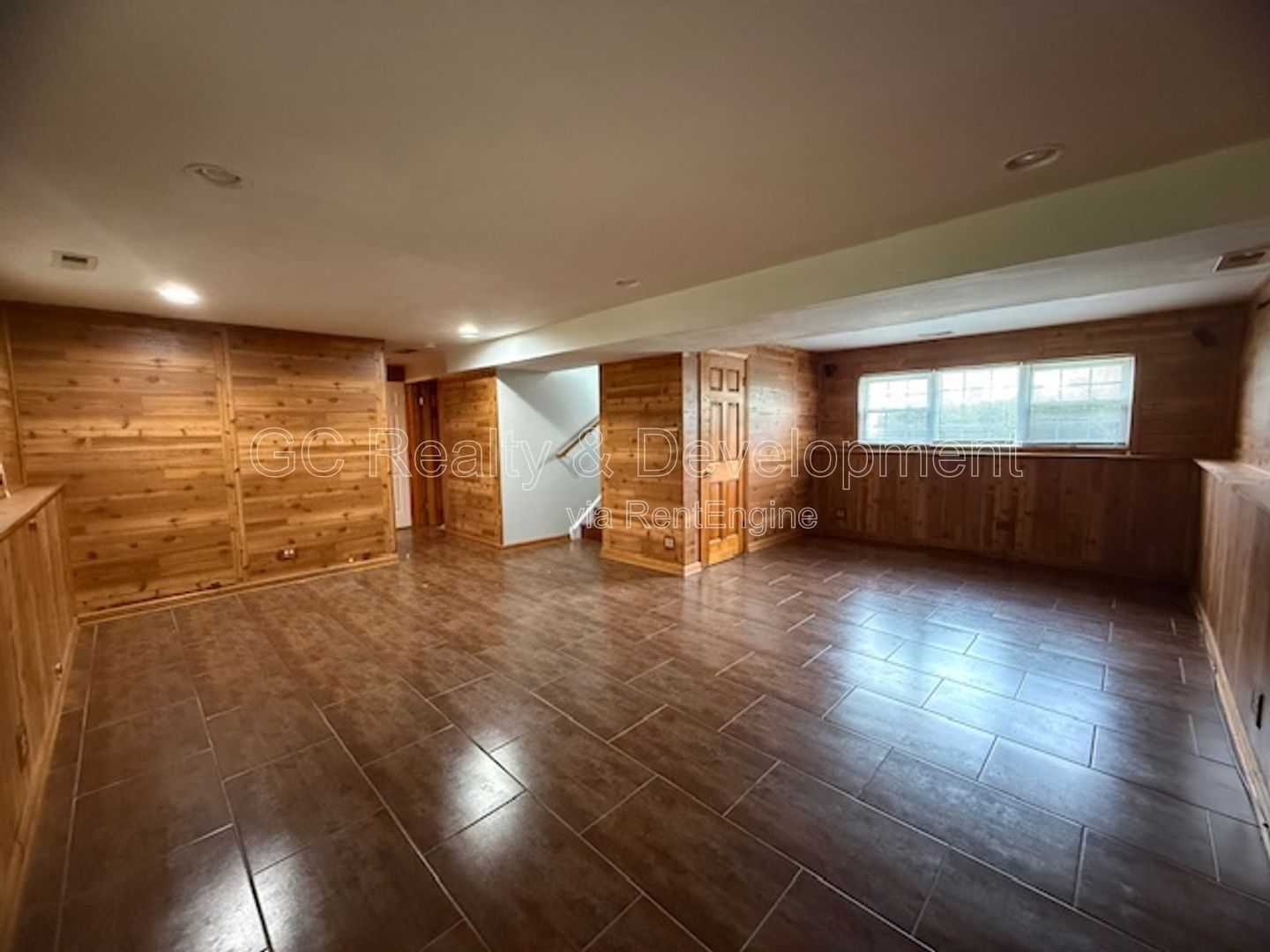 *** 3 BDRM - 2 BTH / FENCED YARD W LRG DECK / SS APPL / FINISHED BASEMENT / ATTACHED GARAGE *** property image