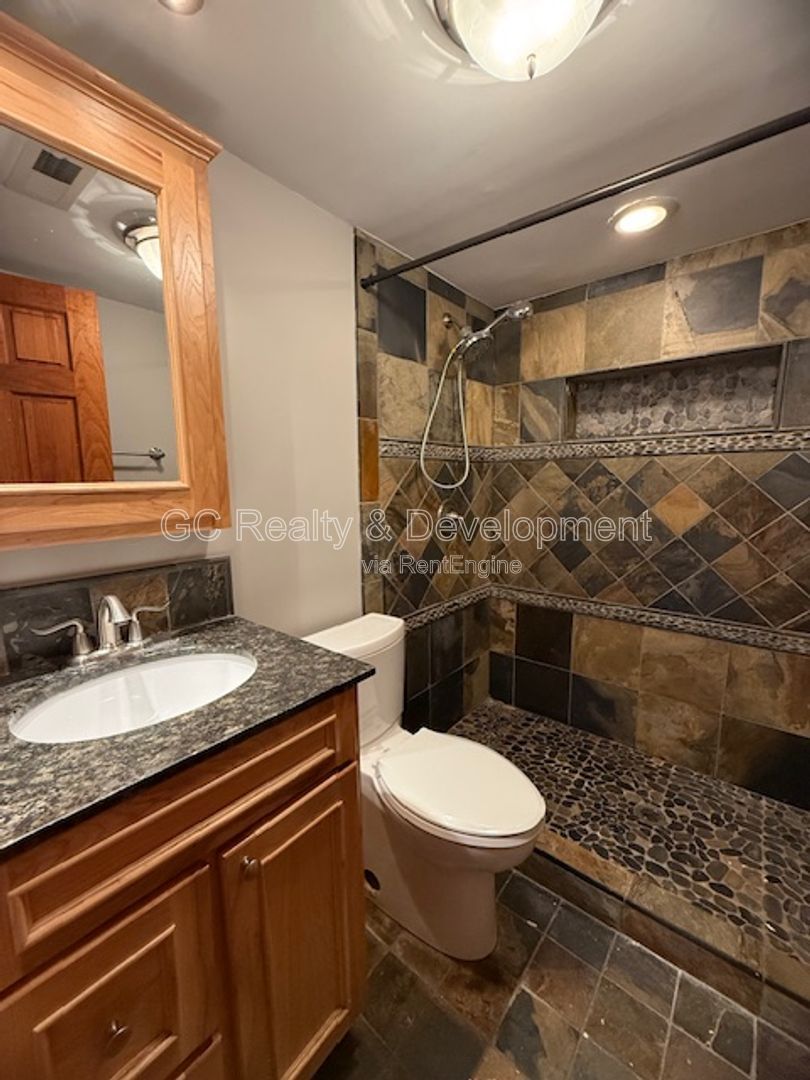 *** 3 BDRM - 2 BTH / FENCED YARD W LRG DECK / SS APPL / FINISHED BASEMENT / ATTACHED GARAGE *** property image