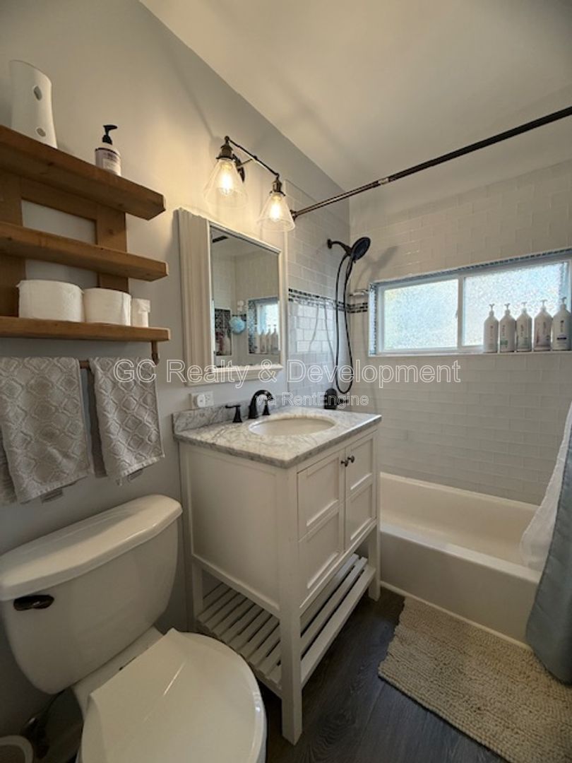 *** COMING SOON 6/01/26! / 4 BDRM - 2 BTH / SS APPL / FINISHED BSMT / IN UNIT LAUNDRY / FENCED YARD / CENTRAL AC *** property image