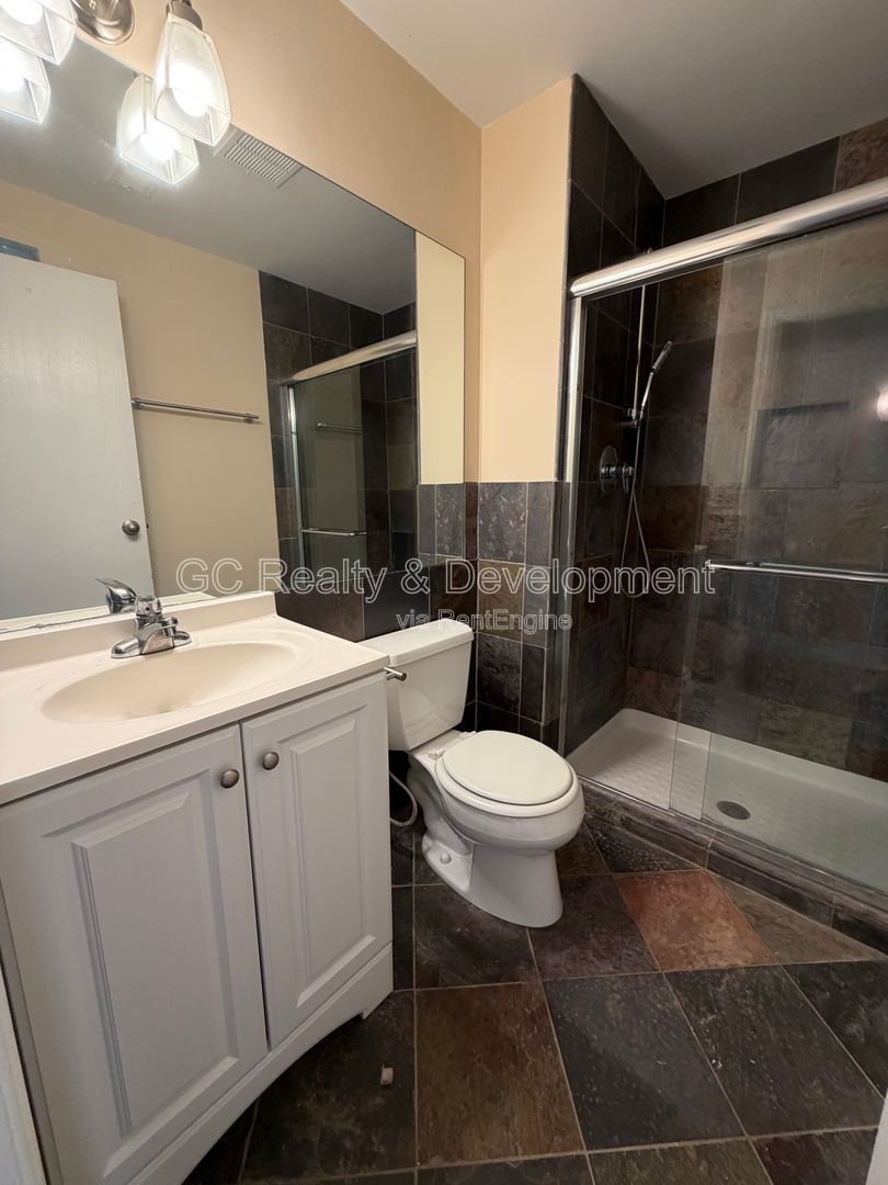 *** 2BR - 2BA / HARDWOOD FLOORS / IN UNIT LAUNDRY / CENTRAL AC / WALK TO TRAIN *** property image