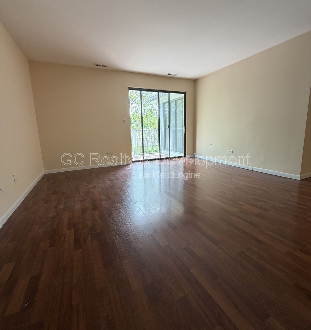 *** 2BR - 2BA / HARDWOOD FLOORS / IN UNIT LAUNDRY / CENTRAL AC / WALK TO TRAIN *** property image