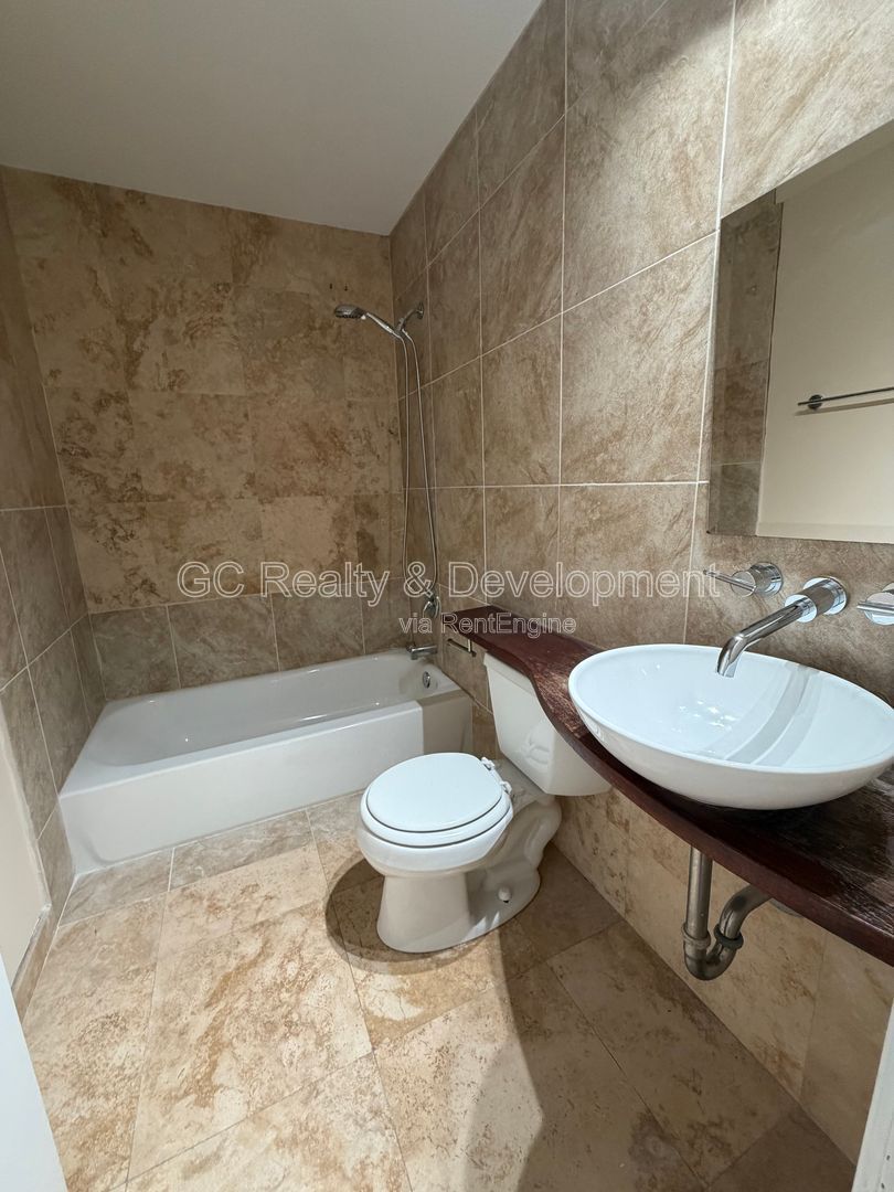 *** 2BR - 2BA / HARDWOOD FLOORS / IN UNIT LAUNDRY / CENTRAL AC / WALK TO TRAIN *** property image
