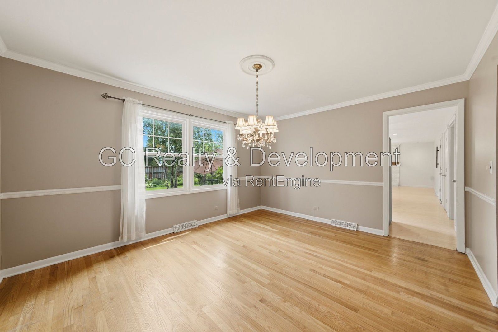 *** 4BR - 3BA / Hardwood Floors / Fenced Yard / Central Air / Garage / In-Unit Laundry *** property image