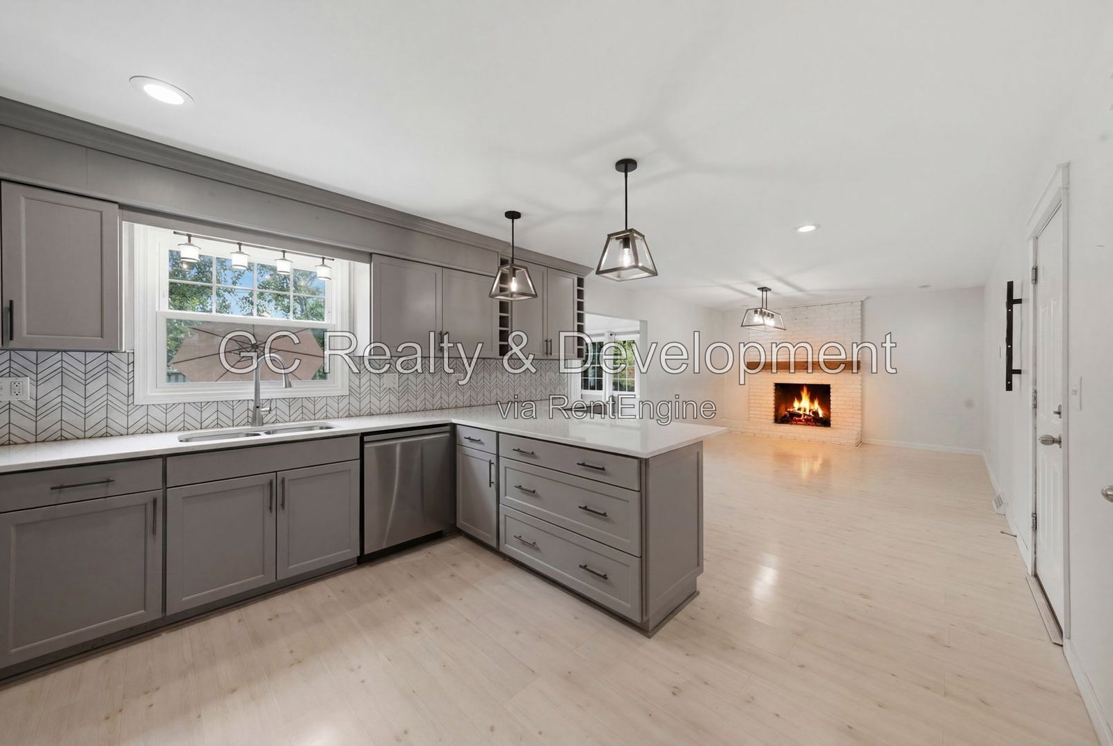*** 4BR - 3BA / Hardwood Floors / Fenced Yard / Central Air / Garage / In-Unit Laundry *** property image