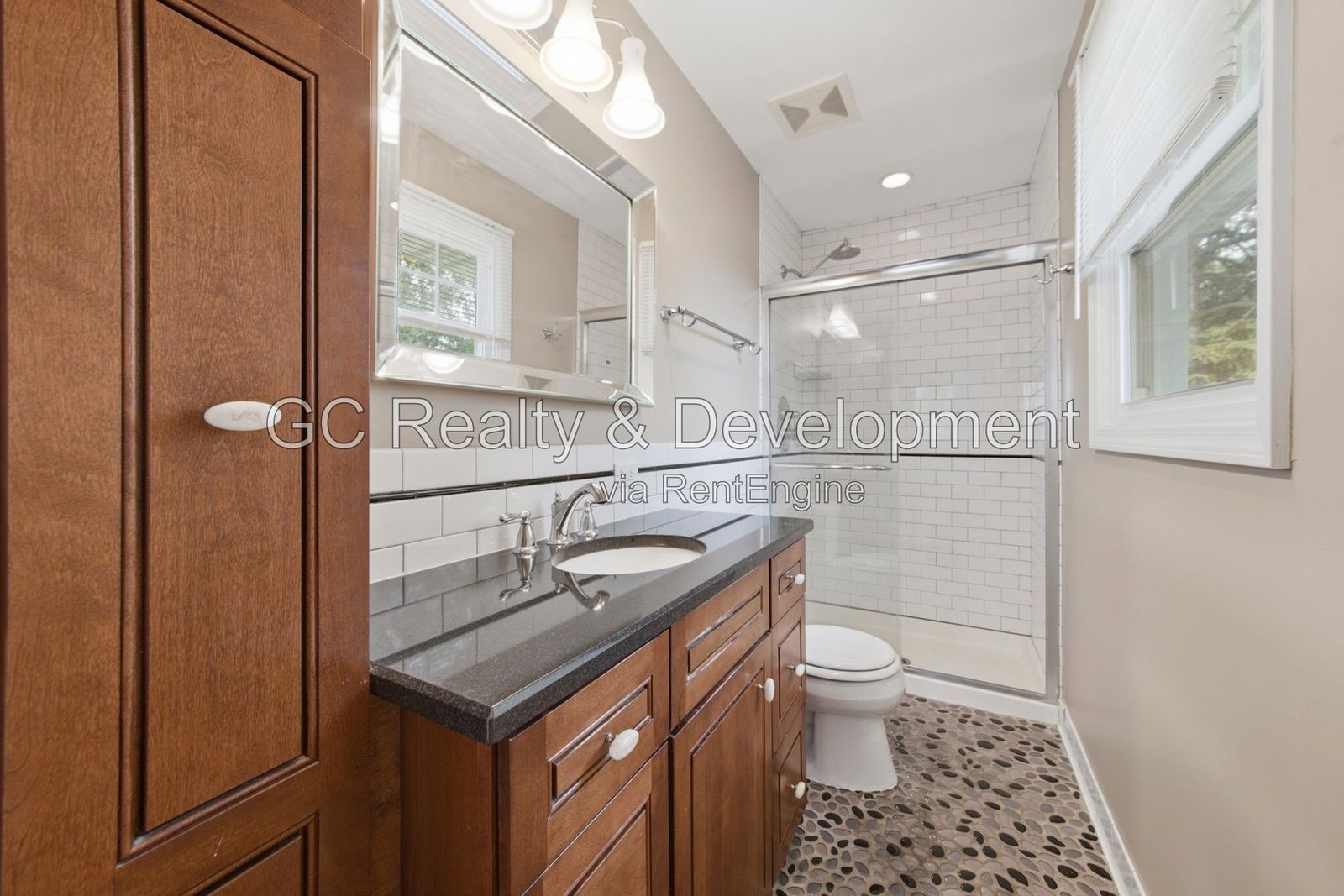 *** 4BR - 3BA / Hardwood Floors / Fenced Yard / Central Air / Garage / In-Unit Laundry *** property image