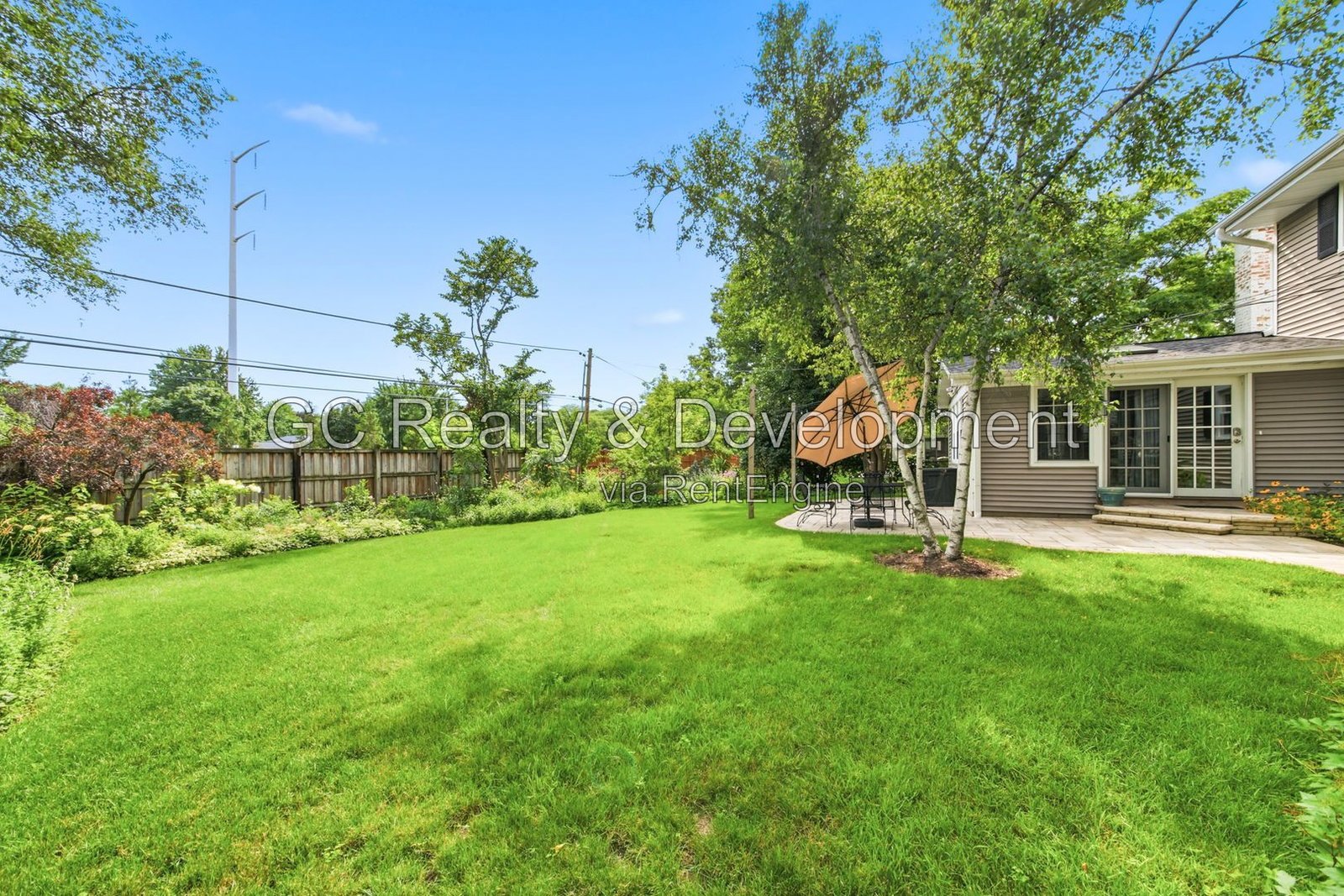 *** 4BR - 3BA / Hardwood Floors / Fenced Yard / Central Air / Garage / In-Unit Laundry *** property image