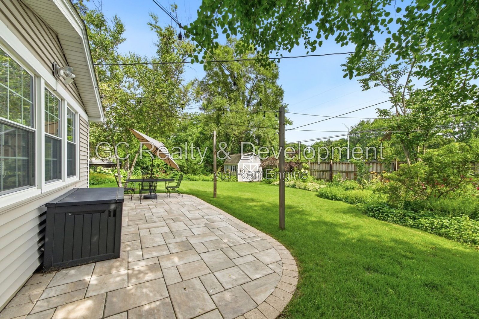 *** 4BR - 3BA / Hardwood Floors / Fenced Yard / Central Air / Garage / In-Unit Laundry *** property image
