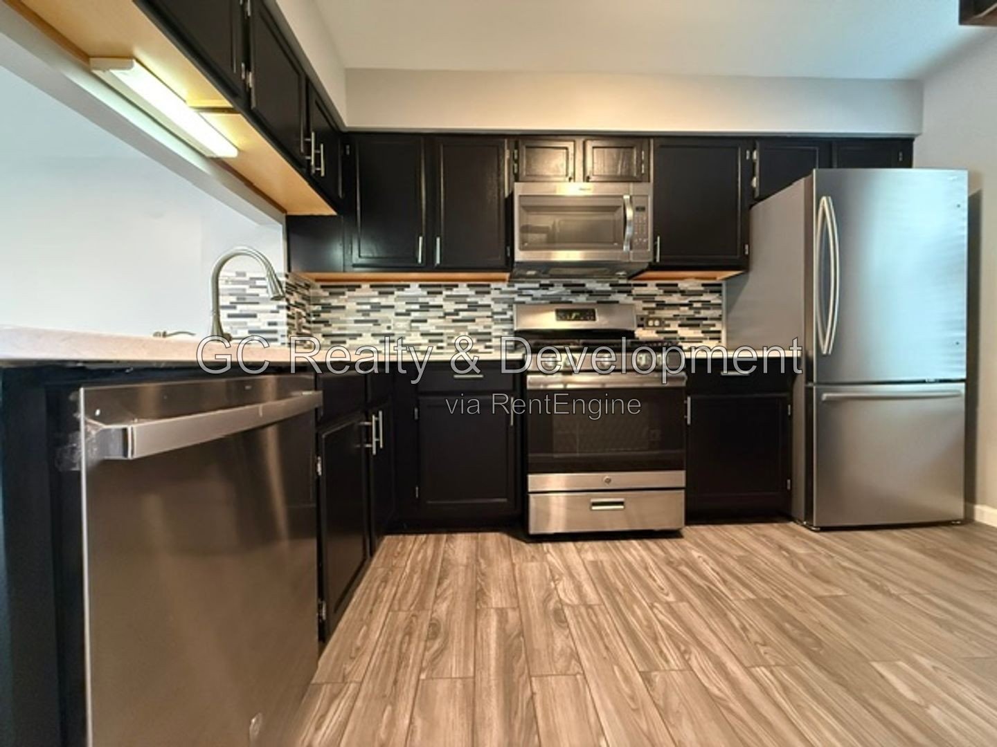 *** 2BR-1.5BA / SS APPLIANCES / IN-UNIT LAUNDRY / ATTACHED GARAGE *** property image
