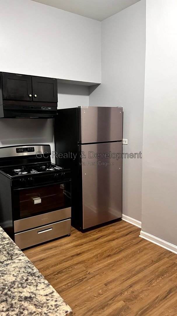 *** 4BR-1BA / SS APPLIANCES / IN-UNIT LAUNDRY / WOOD FLOORING / ONY PAY GAS AND ELECTRIC *** property image