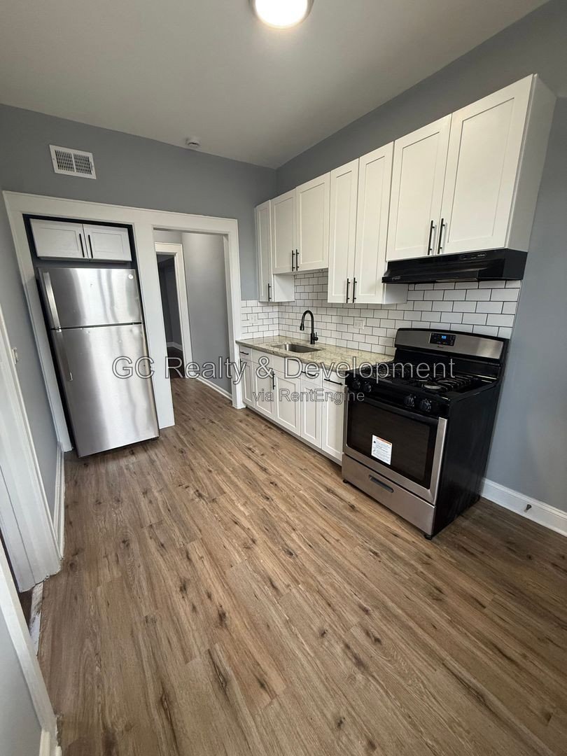*** 4BR, 2BA / WOOD FLOORING / SS APPLIANCES / ON-SITE LAUNDRY / PET FRIENDLY *** property image