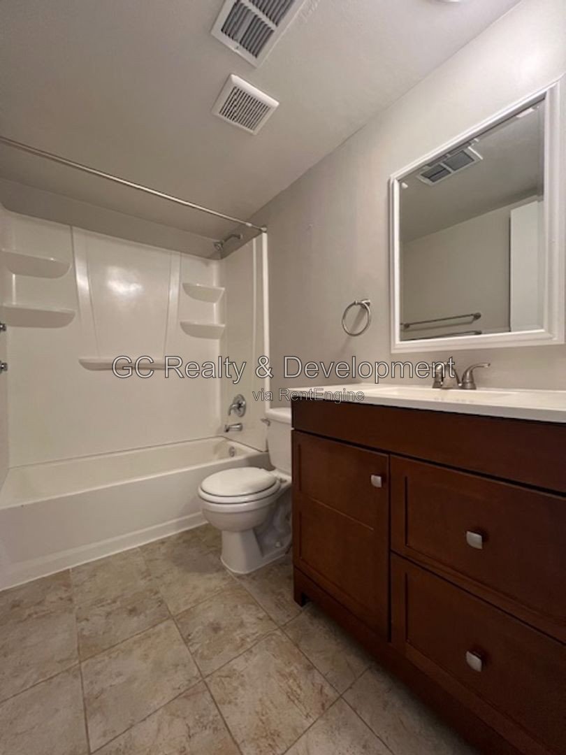 *** UPDATED TOWNHOME / 2BR - 1.5BA / SS APPLIANCES / FENCED PATIO / PARKING INCL *** property image