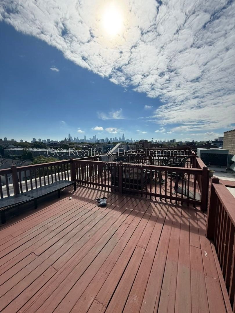 *** Spacious 3-Bedroom, 2-Bath Lincoln Park Condo with Private Rooftop Deck, Balcony & Parking *** property image